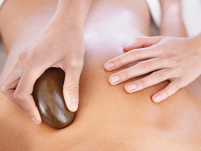 Lợi ích của massage đá nóng